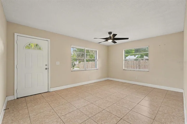 The open living room provides a comfortable gathering space with plenty of natural light.