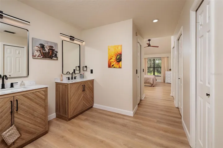 master bathroom with closets