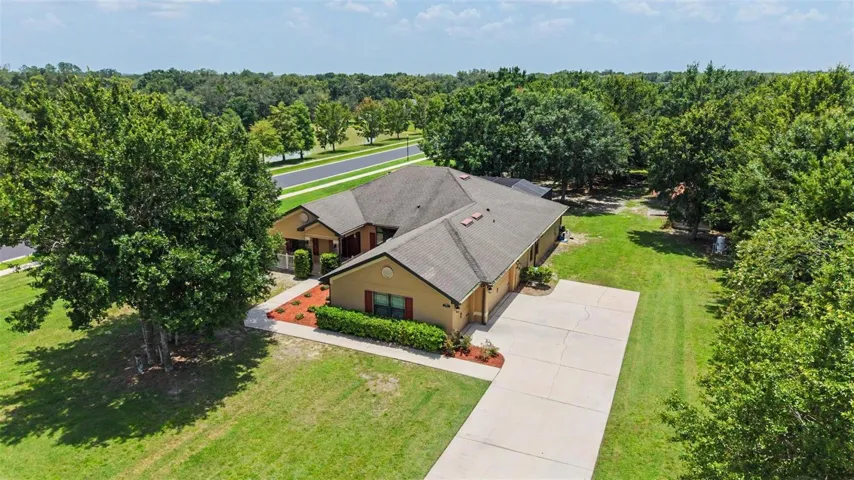Aerial View of the Home and Large Driveway