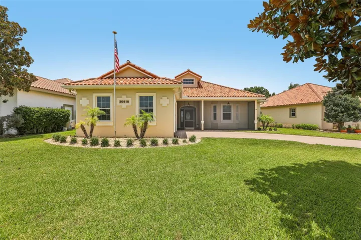 Beautifully upgraded home with screened in porch and views to front and rear