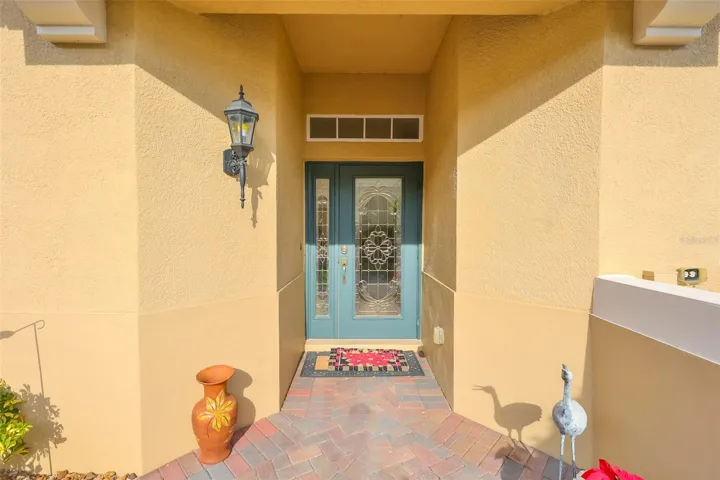 Beautiful lead glass entry door welcomes you and your guests into this stunning updated condo.  No stairs, no elevators, just convenient access.