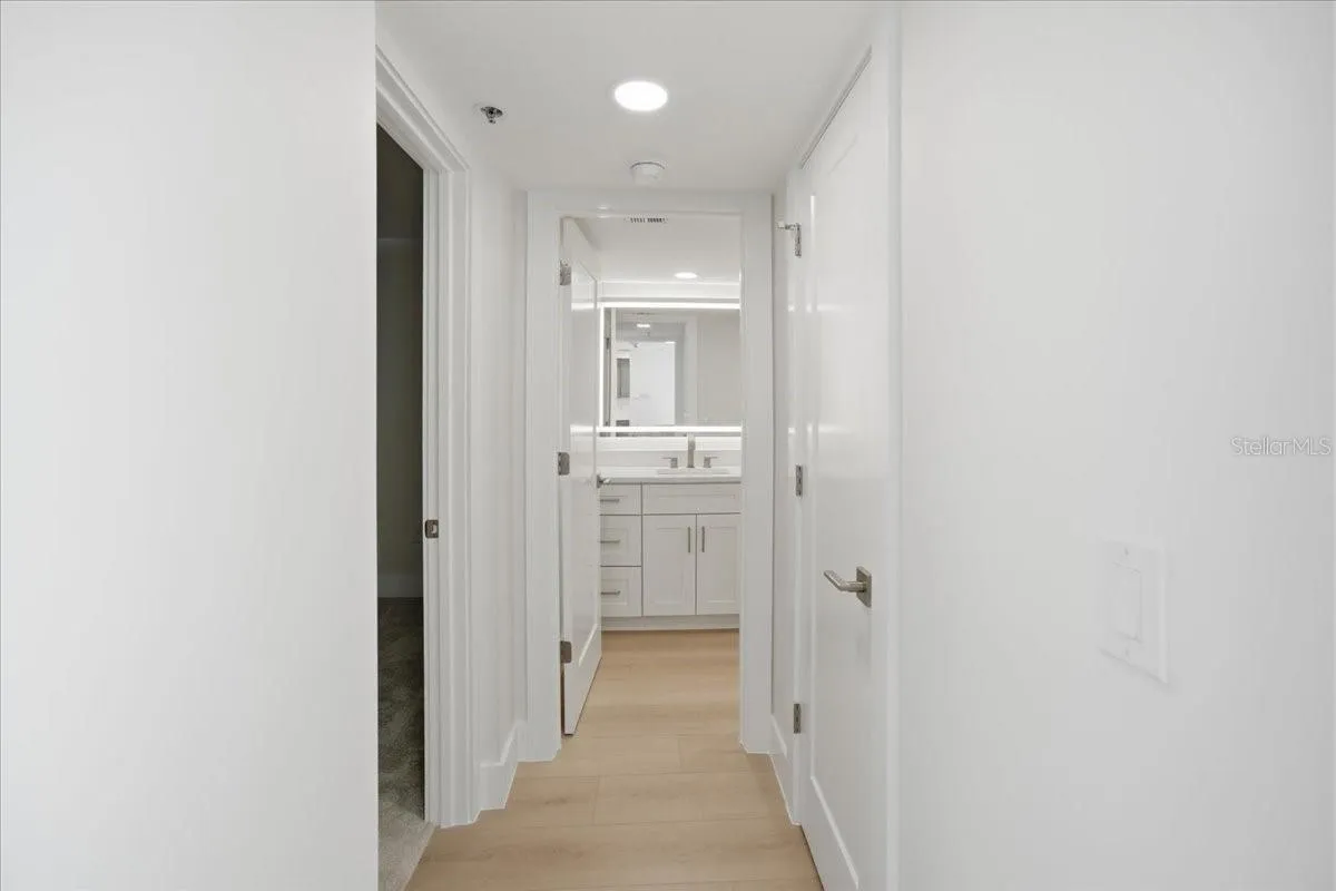 New Hallway to Guest Bathroom. Can Be Closed Off w/New Pocket Doorway