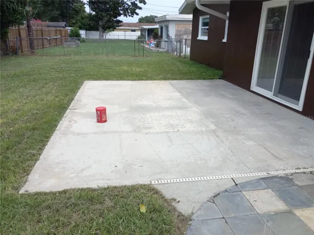 14 x 18 cement slab with 110 & 220 electric ready for you hottub?? Sliders open to family room
