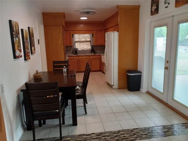 looking into updated kitchen, upgraded cabinets, granite countertops, ceramic tile flooring