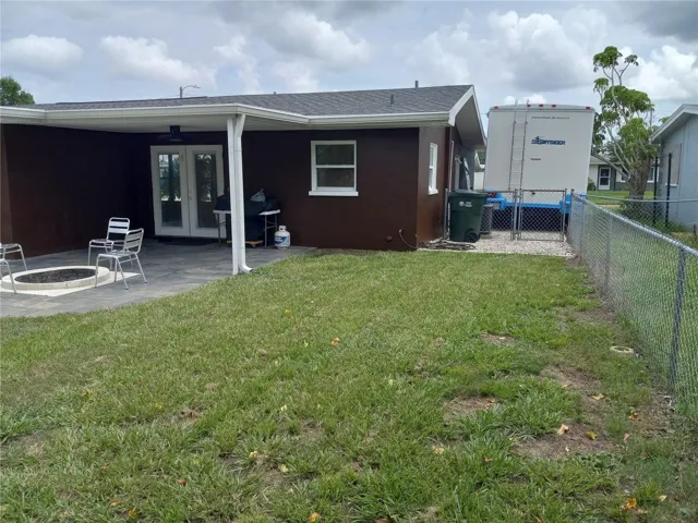 14 x 20 covered patio with slate flooring. opens through french doors off kitchen