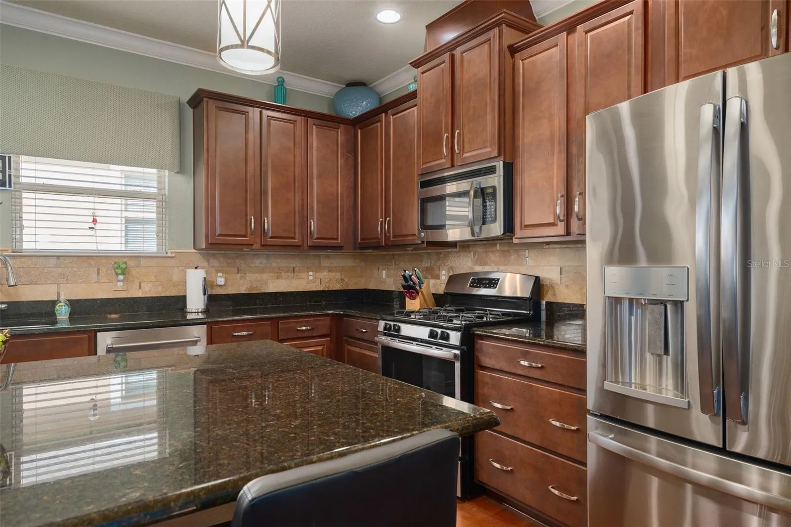 Beautiful Solid Wood Raised Panel Cabinetry. The large drawers offer easy storage for larger items. The Microwave is vented to the outside.