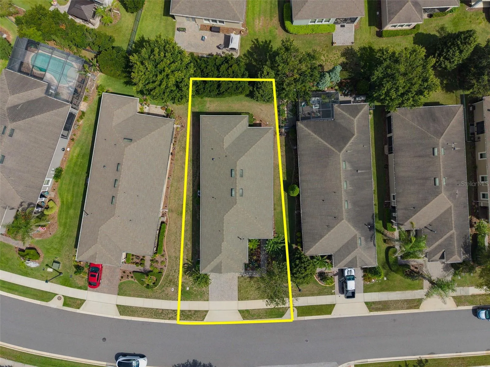 Overhead View showing the approximate property lines. The lot is oversized offering additional space between the homes.