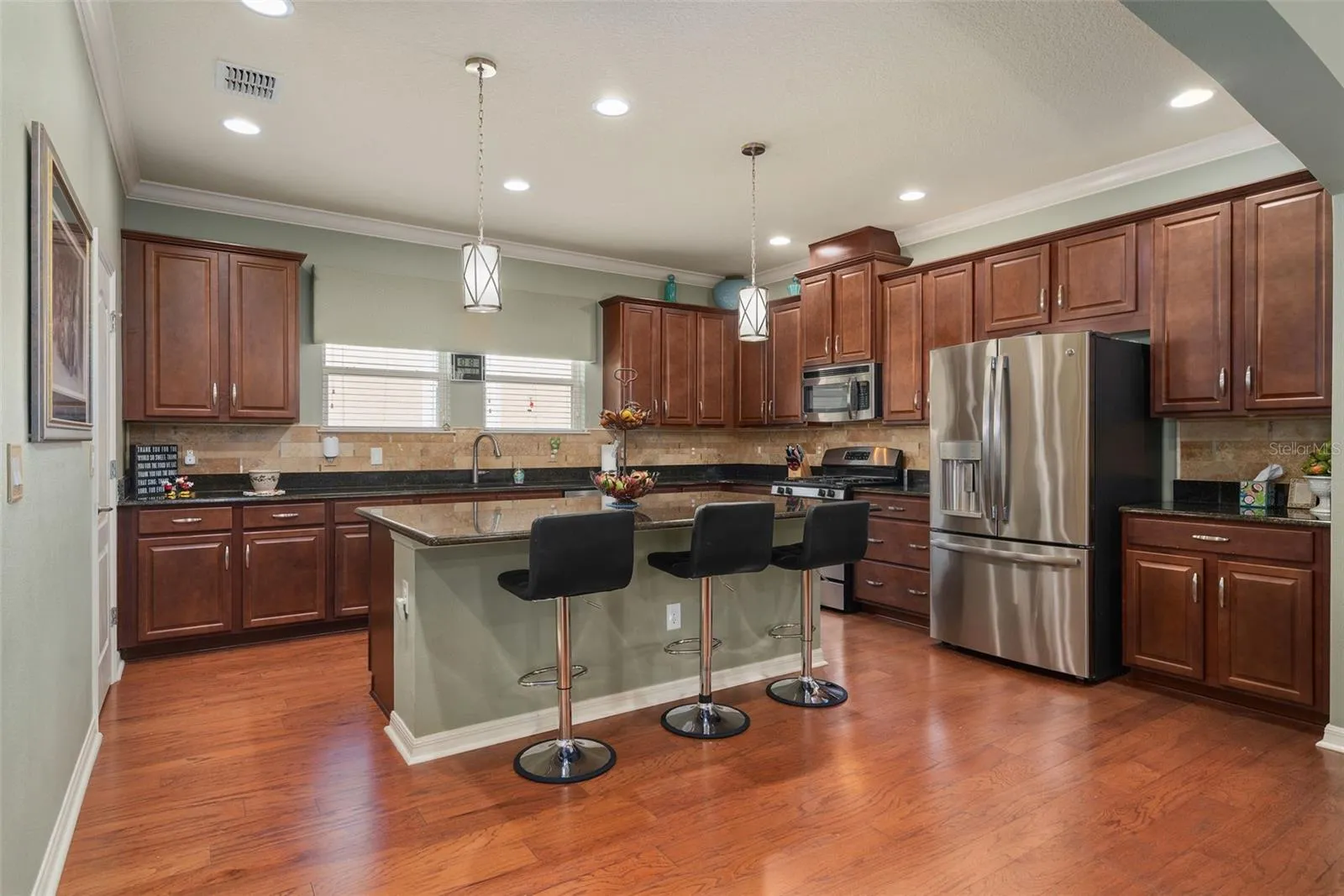 There's plenty of room when entertaining and everyone gathers around the Kitchen