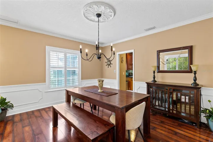 Spacious Dining Room with more of that natural light peaking in