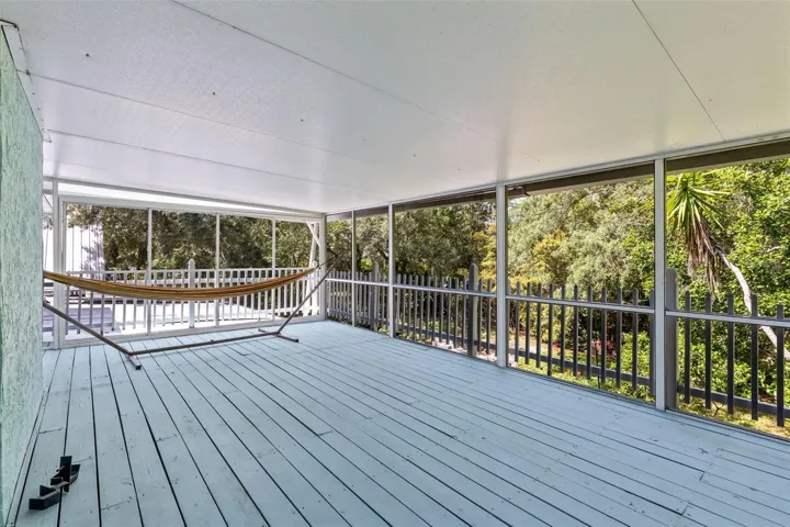 Your private screened in patio off of the Master Bedroom