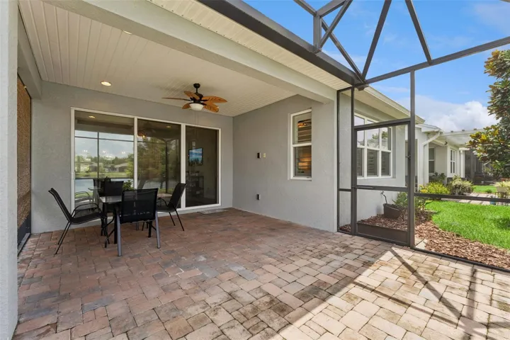 Screen enclosed covered patio w/ brick pavers