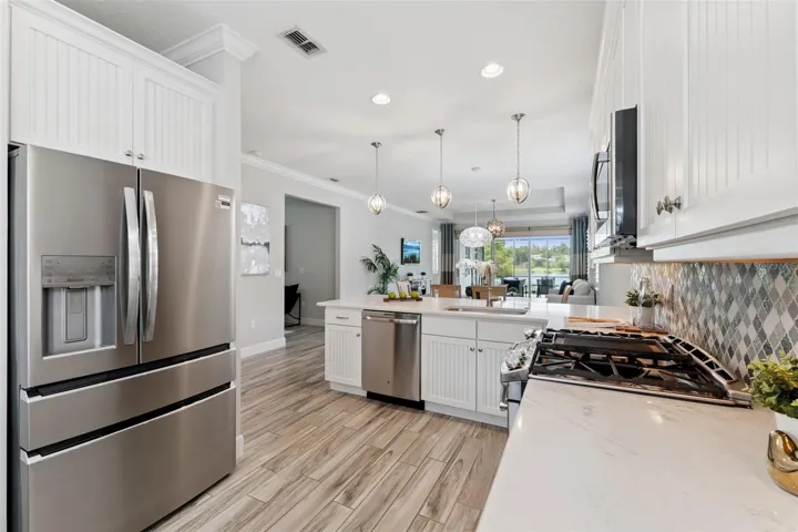 French door style refrigerator & porcelain plank tile flooring