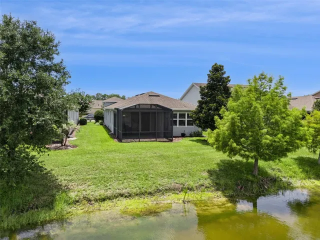 Aerial view of the backyard behind the home