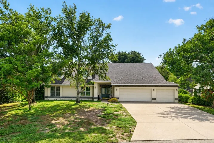 Welcome Home! Almost 1/2 an acre with plenty of space inside and out!