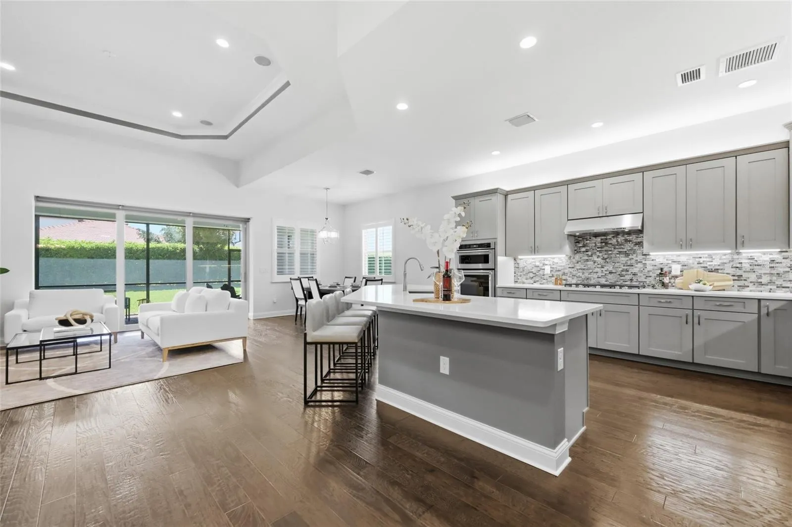 Chefs Kitchen with Quartz Counter tops, Upgraded Natural Gas Range, Upgraded Cabinets, and Oversized Island