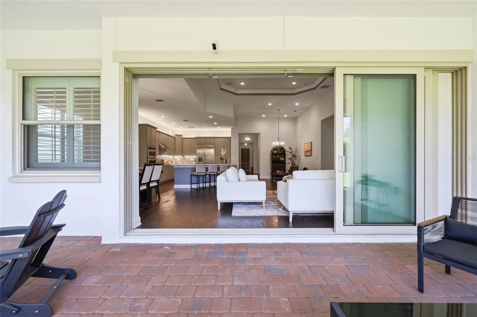 Fully Collapsing Sliding Glass Doors to Screen Enclosed Patio