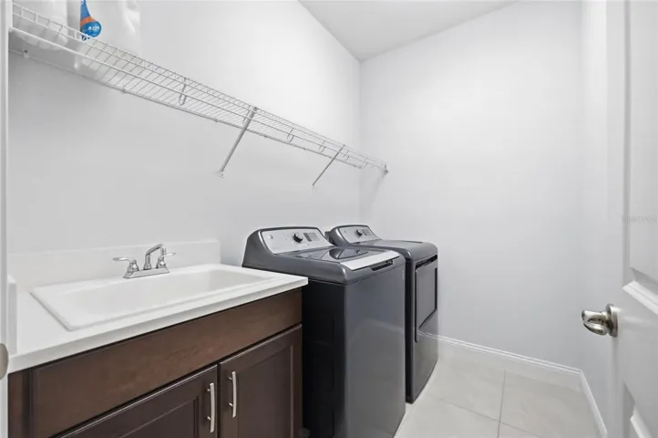 Oversized Laundry Room with Sink & Storage