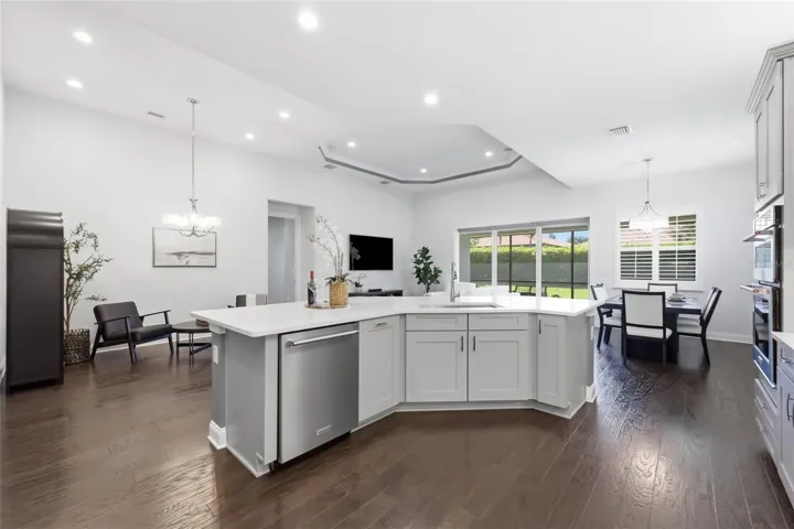Chefs Kitchen with Quartz Counter tops, Upgraded Natural Gas Range, Upgraded Cabinets, and Oversized Island