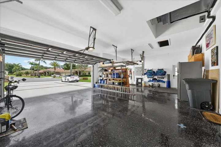 Three car garage with epoxy flooring
