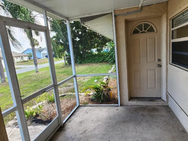 The front entry has 2 doors. The door on the left leads to the living room and the one on the right to the Bonus Room.