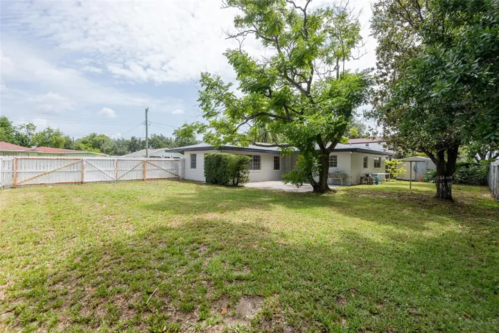 A true double lot with room for a pool and a large gate to park an RV if you like.