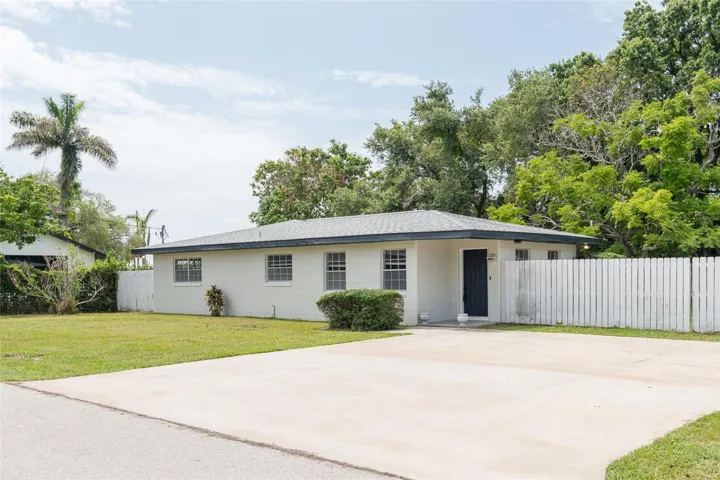 The classic bones of a concrete block mid-century home await you