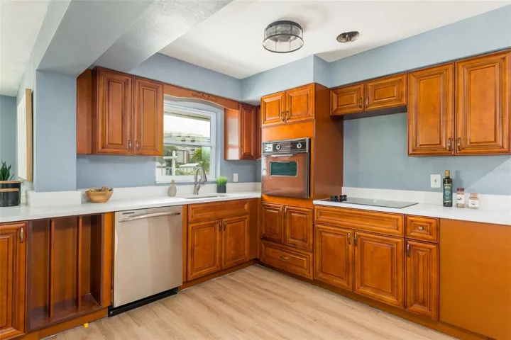 Quartz Countertops, Wood Cabinets, and New Appliances (ask your agent for details)