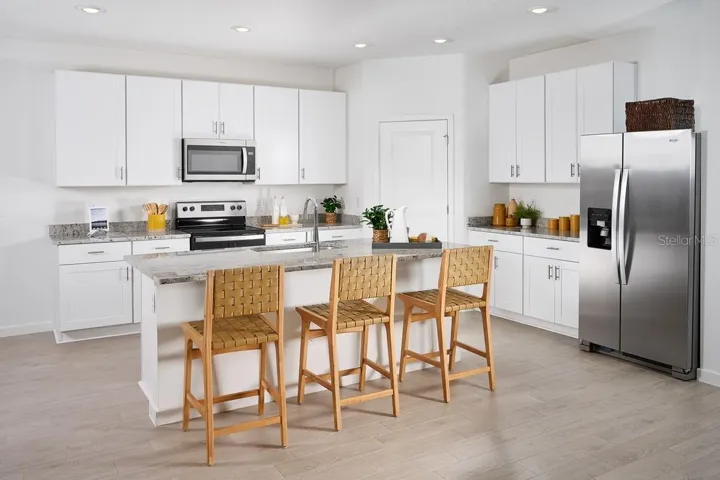 Photo is not of the actual home, but is an inspirational photo of builder’s model home and may depict options, furnishings, and/or decorator features that are not included.