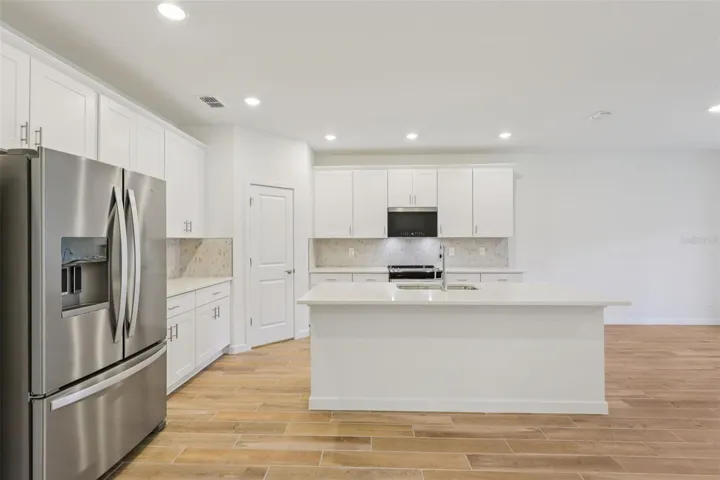 The interior photos are of another home with the same floor plan and interior finishes. Some details may vary