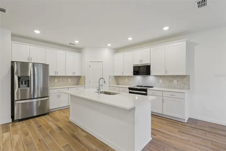 The interior photos are of another home with the same floor plan and interior finishes. Some details may vary