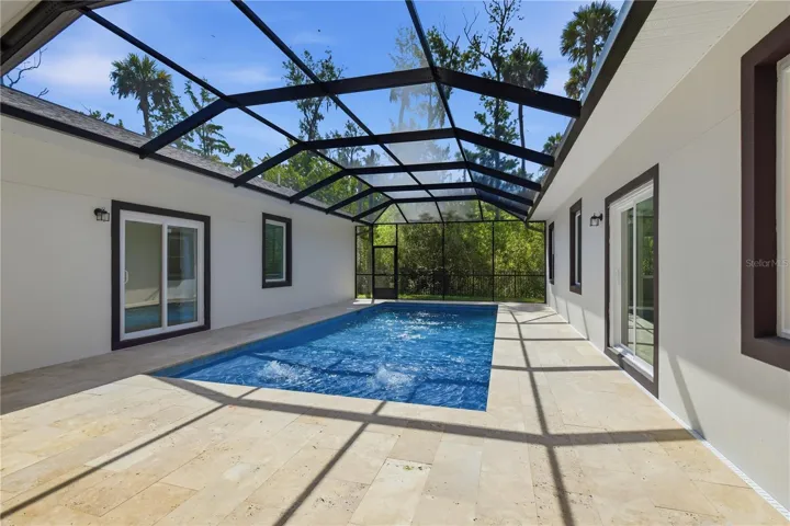 Saltwater pool and reserve behind the property