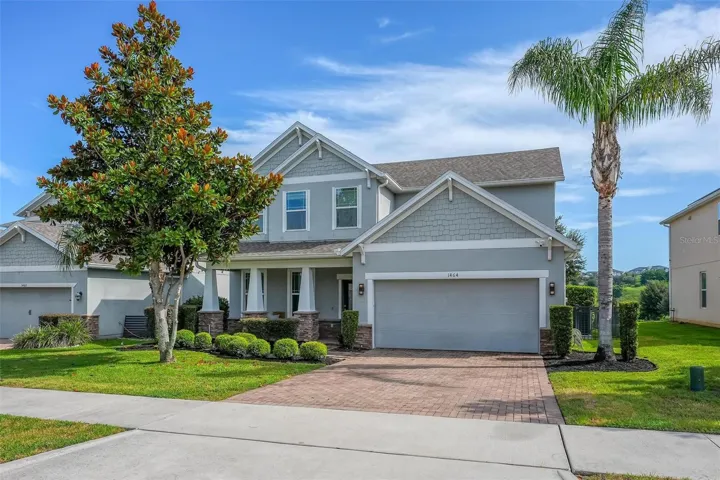 Welcome to 1464 Cabot Drive, in the Gated Community of Harvest Landing, paved driveway