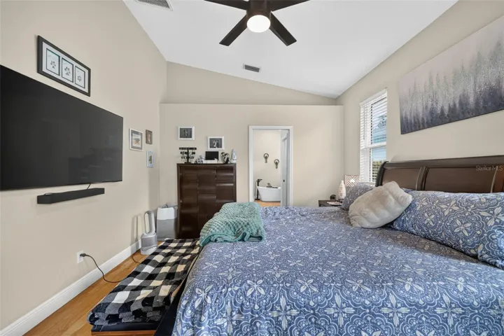 Primary bedroom with EnSuite bath and large walk in closet