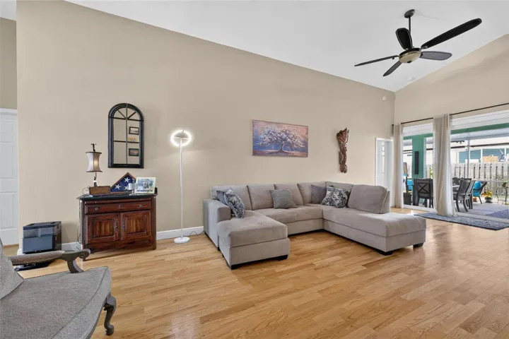 The living area is large and  and has sliders leading to the lanai,