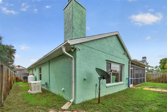 The property has enough yard area, fenced and a genrac full house generator.