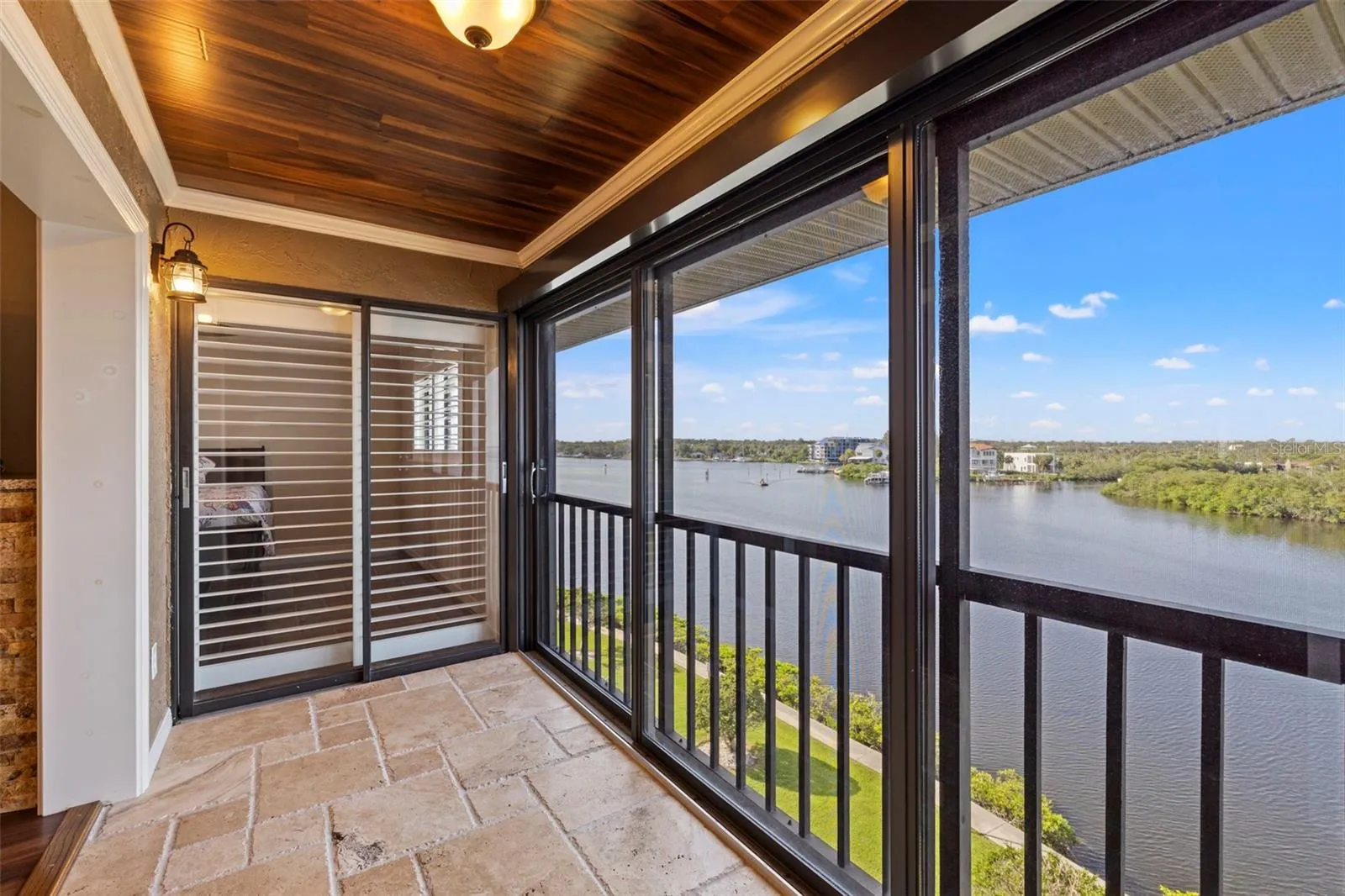 Beautifully remodeled Florida Room with remote control blinds