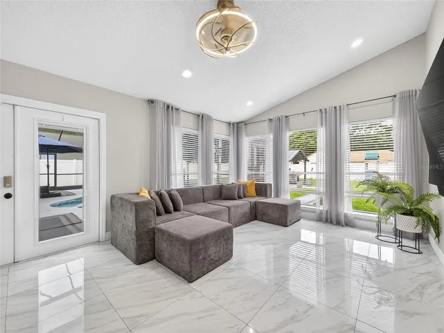 Family Room with French Doors and Large Windows