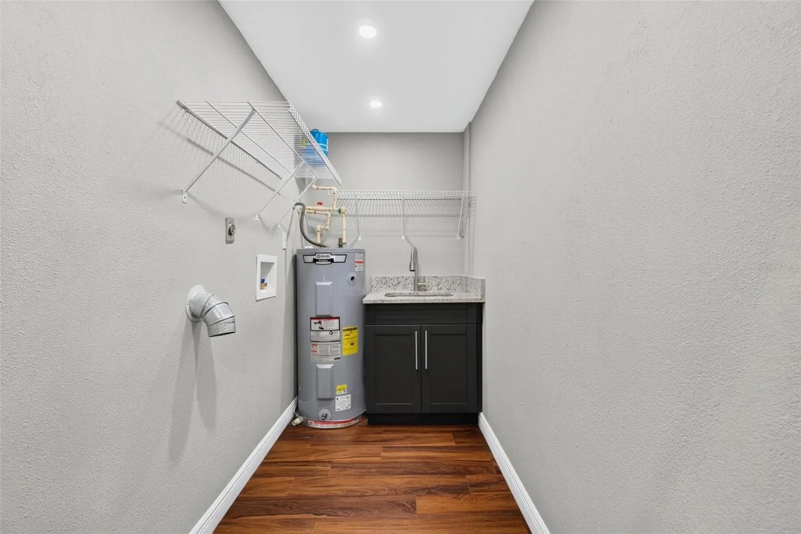 Laundry room with sink