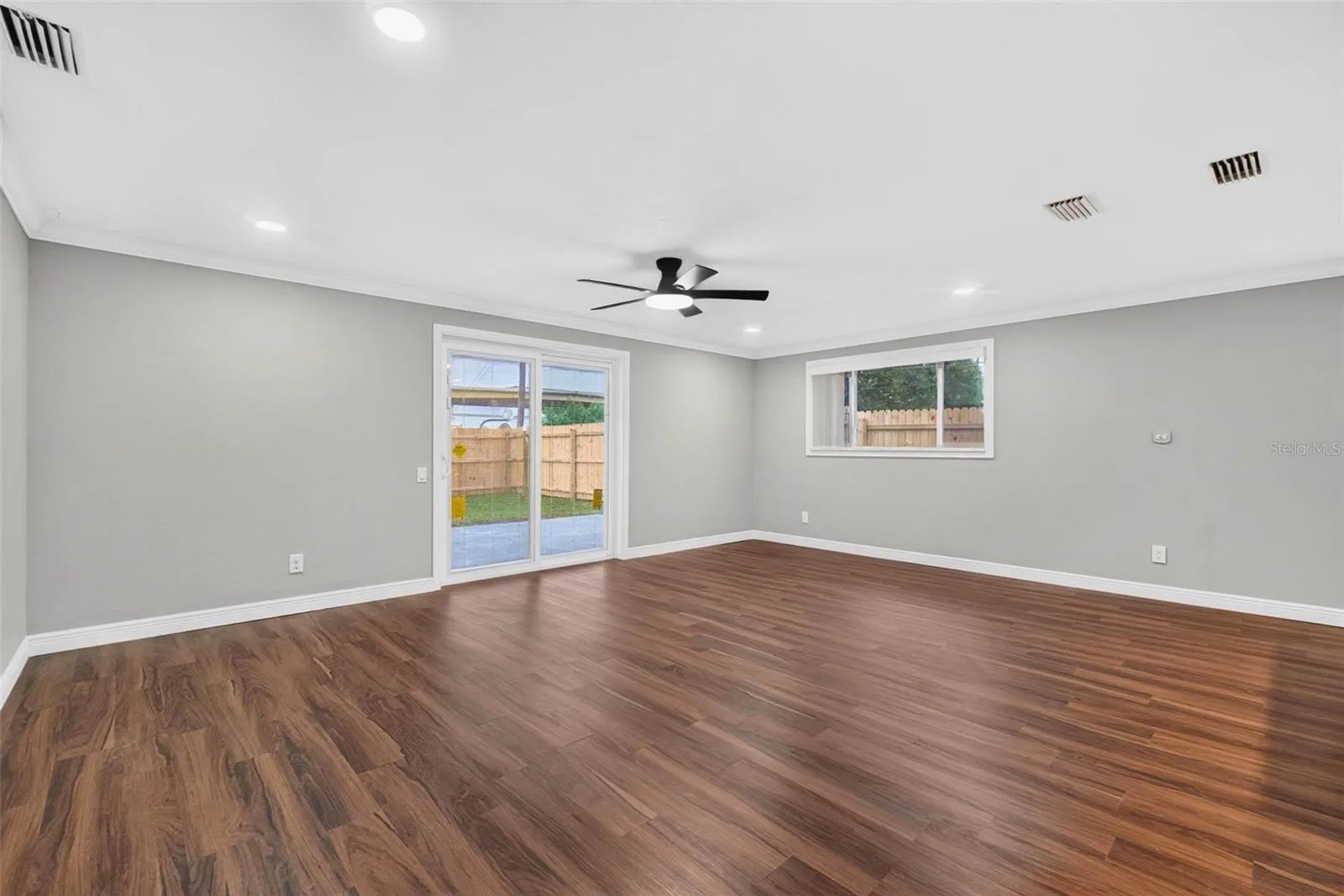 Living room sliders to back patio