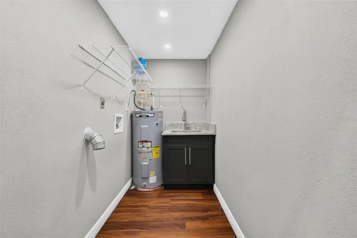 Laundry room with sink