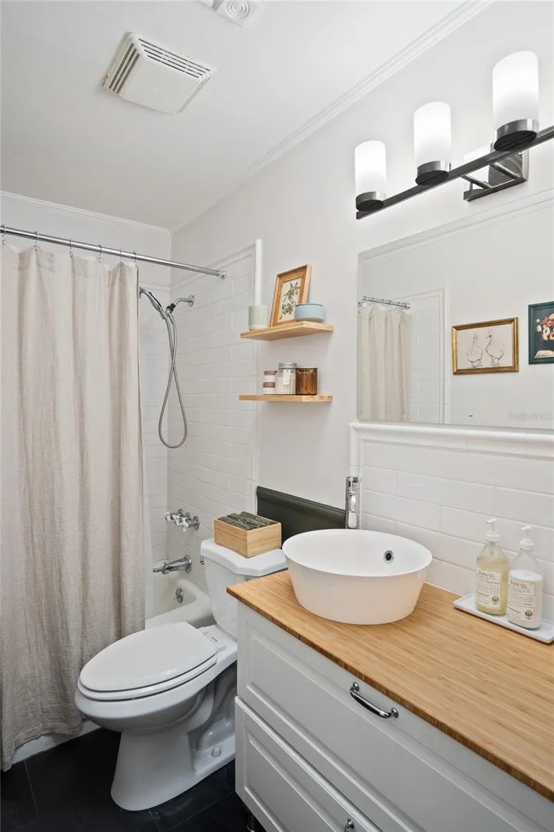 The primary bathroom with a shower and tub.