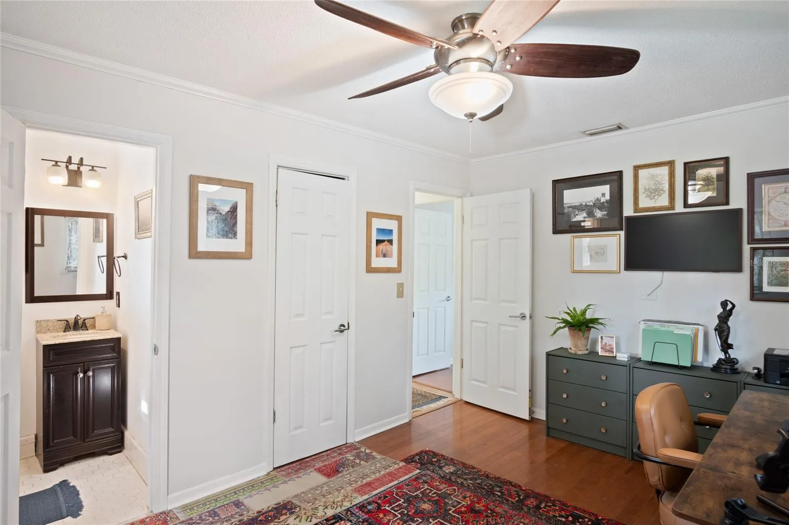 The guest bedroom has a half bath.