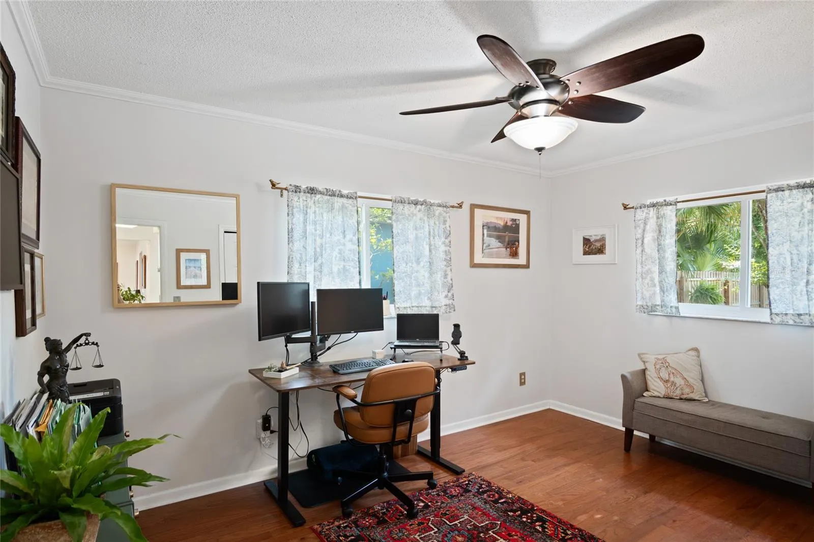 The guest bedroom is being used as an office.