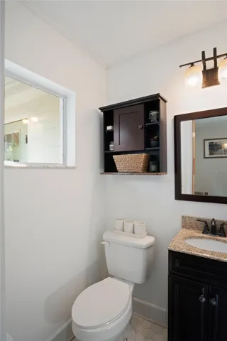 The half bath looks out to the back of the home.