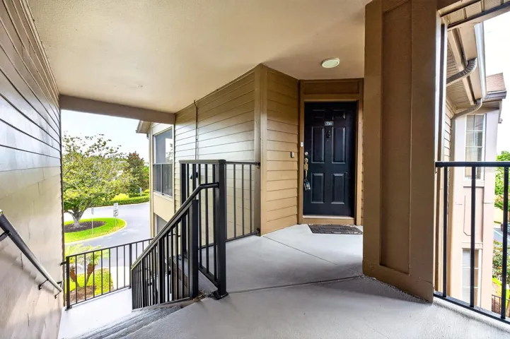 Covered stairs and front entry.
