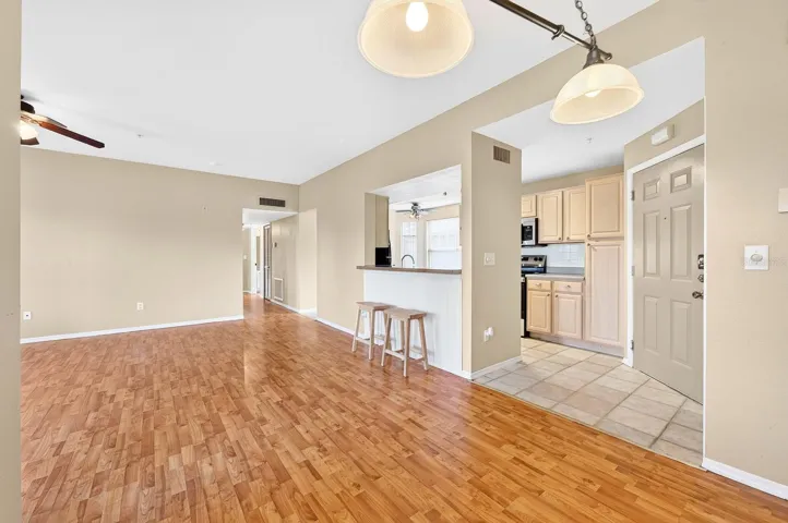 Seamless flow from the kitchen to the living and dining areas.