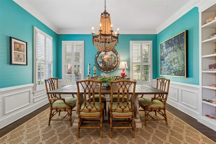 Formal dining and causal living rooms along the front of the house provide gracious entertaining space.