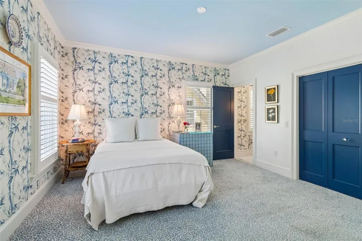Bedroom two with en suite bath is on the second floor with the primary suite.