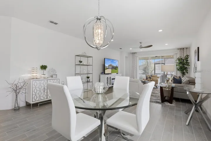 Dining space with custom lighting.