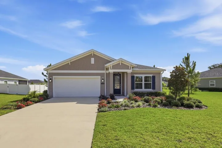 This home will WOW you with the gorgeous landscaping and meticulously maintained yard.